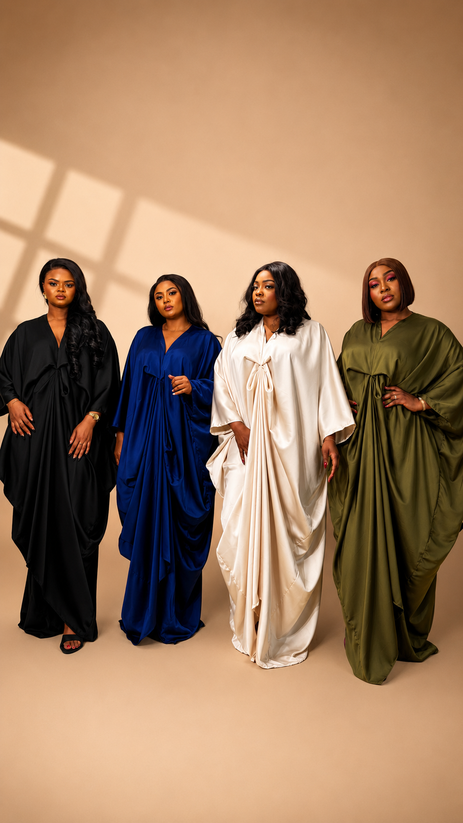 Four women wearing JINNA looks in black, cobalt blue, cream and olive