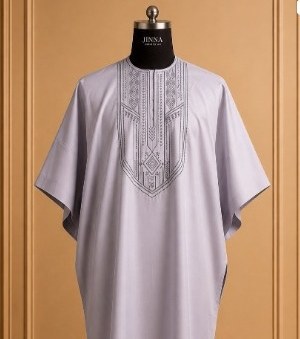 Dove grey kaftan with tonal geometric embroidery on a mannequin